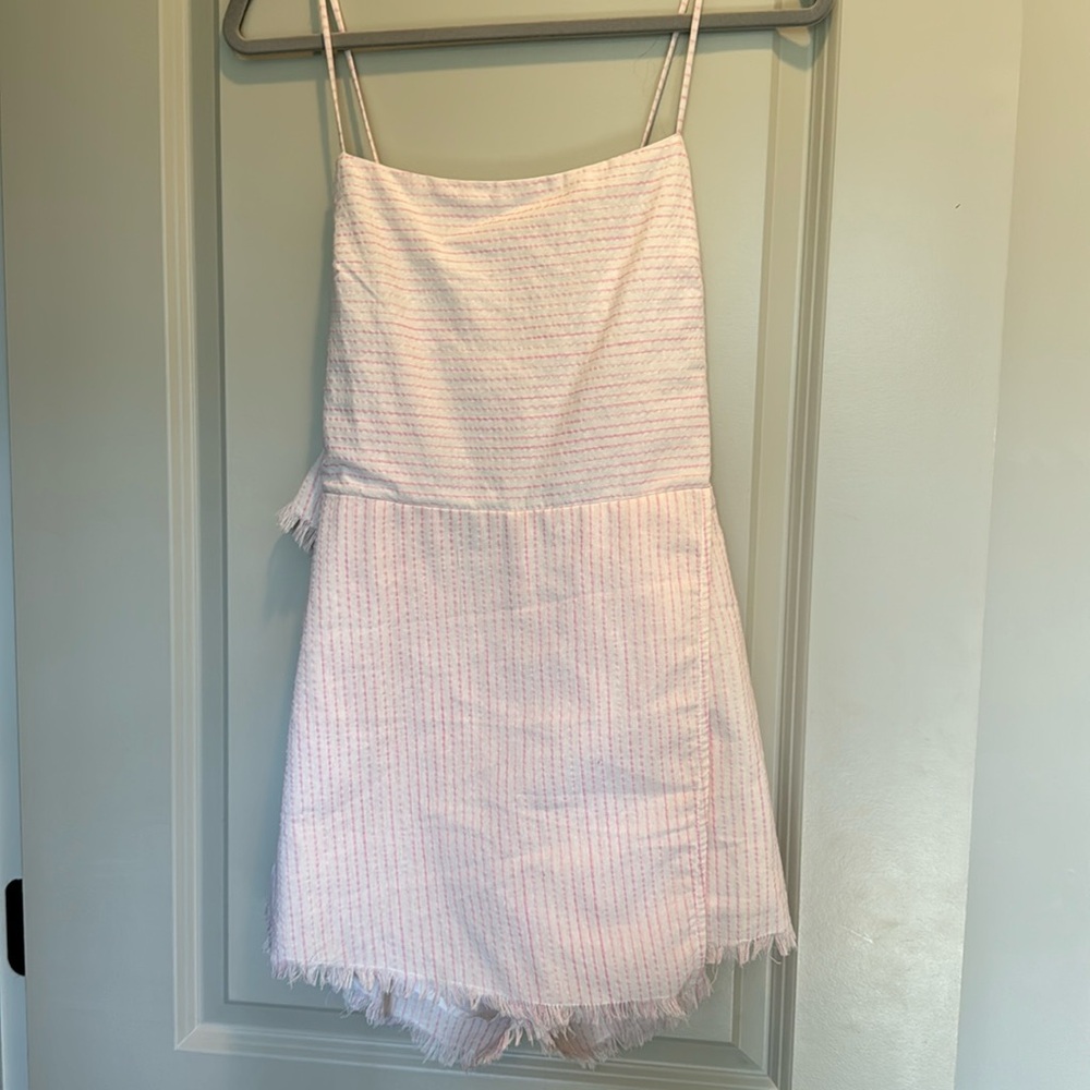 Stripped pink romper with bow tie in back